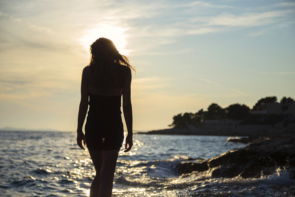 Girl At The Sea