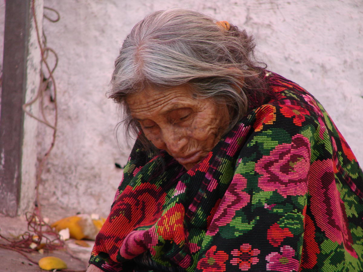 an old mayan woman at chichicastenango