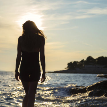 Girl At The Sea